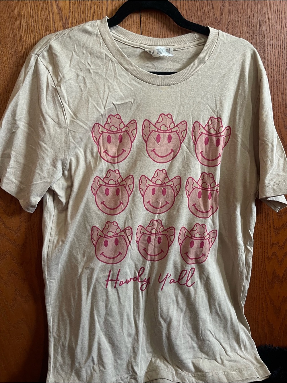 Women’s “Howdy Y'all" Smile Cowboy Tee - Cream with Pink Print